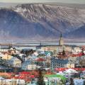 Colourful houses of Reykjavik against a backdrop of snowy mountains