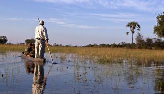 Canoe safari in a traditional mokoro - Okavango Delta - Botswana