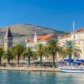 View of the main strip of Split, lined with palm trees along the waterfront