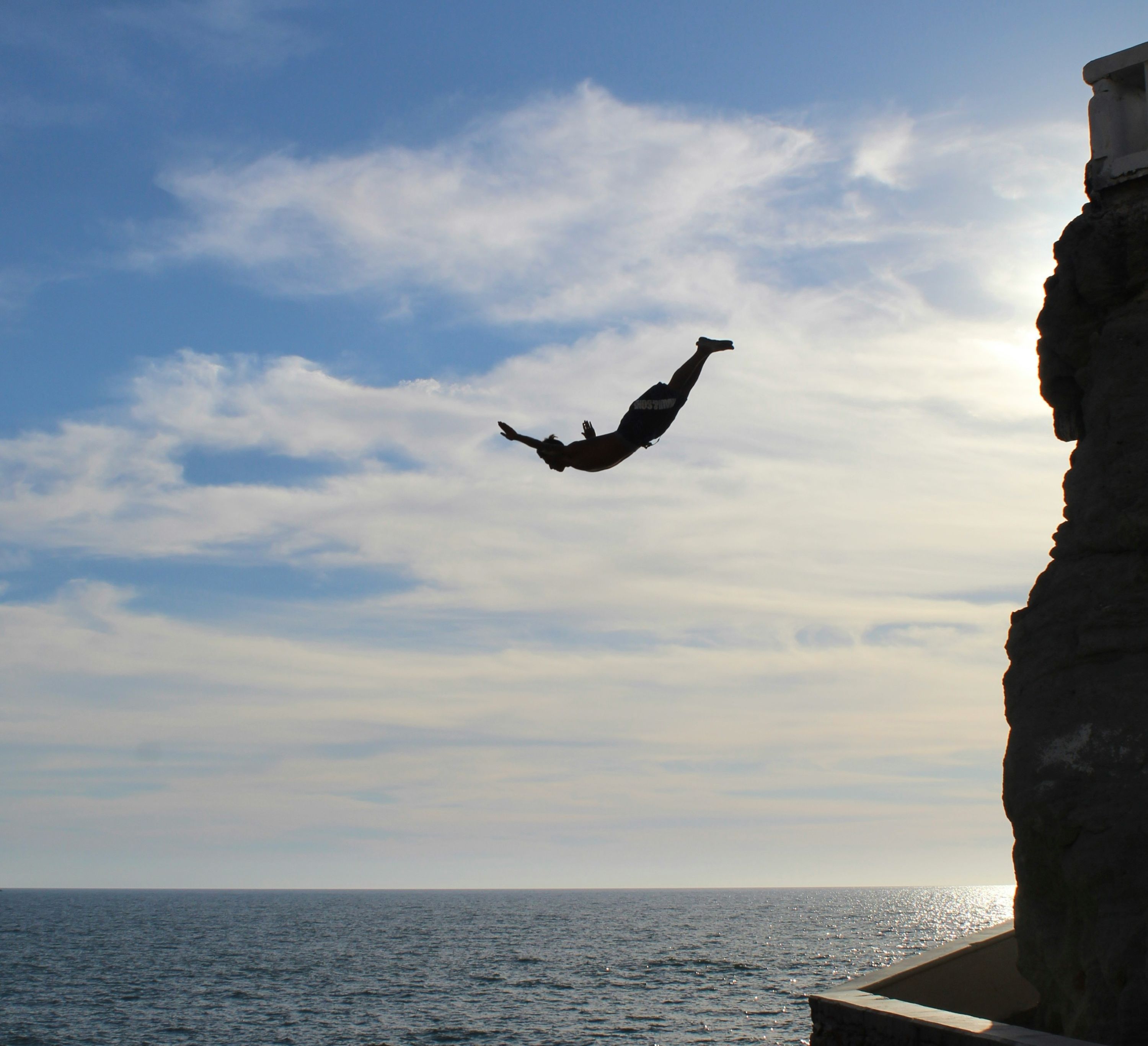 A man Cliff Diving 