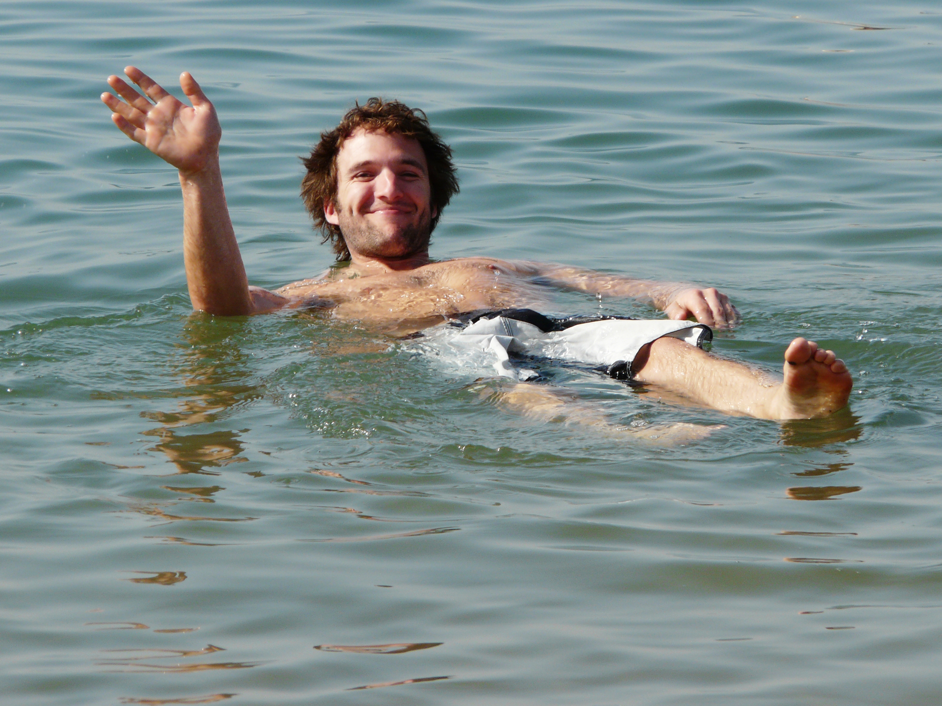 A man floating in the Dead Sea