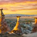 Hot air balloons floating over the stunning landscape of Cappadocia