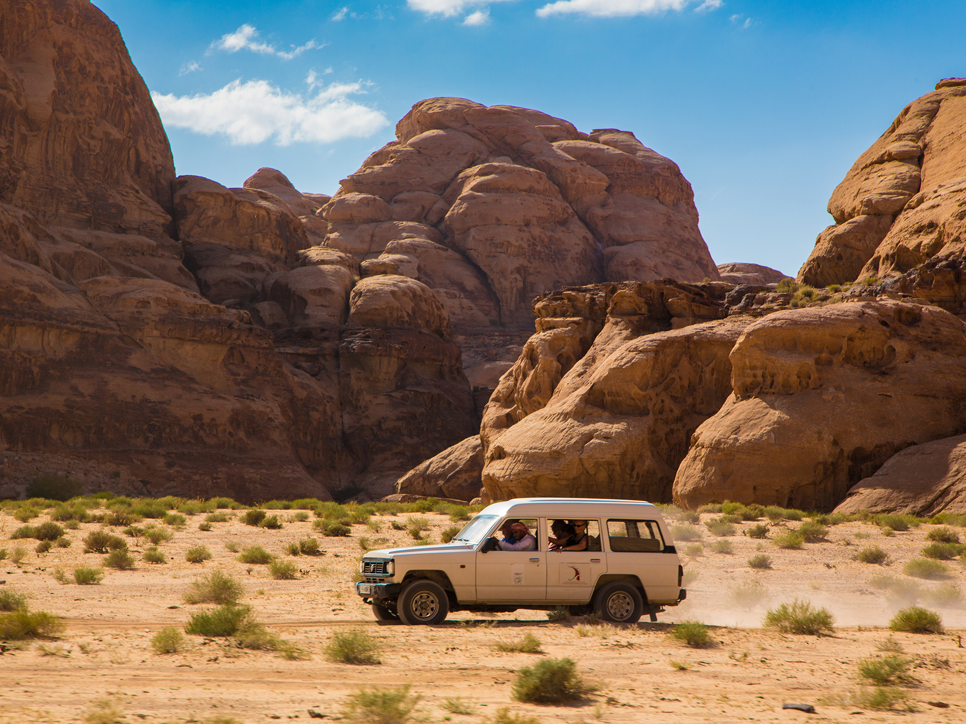 Jeep driving through Wadi Rum