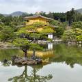 Beautiful lake with a temple in the background in springtime in Kyoto