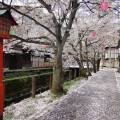 Bridge over water, lit up at night time, in Kinosaki, Onsen