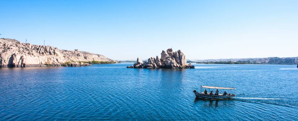 A boat on the sparkling blue water of Lake Nasser