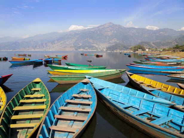 Colourful boats on the edge of the lake in Pokhara