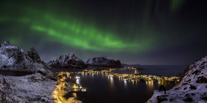 The Northern Lights dance over the Lofoten Islands in Norway