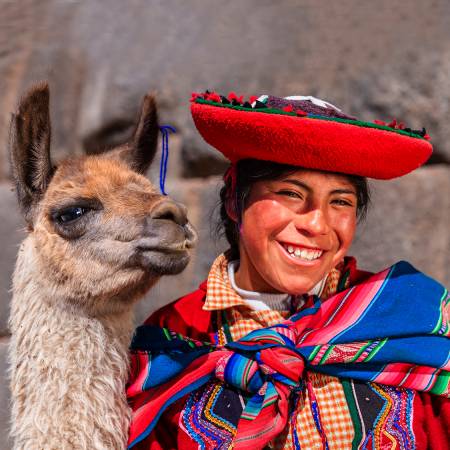 Peruvian lady and llama - Peru Tours - South America Tours - On The Go Tours