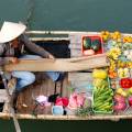 Boat making its way along the Mekong Delta near Can Tho