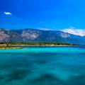 The town of Fethiye perched on the side of a mountain, overlooking to water